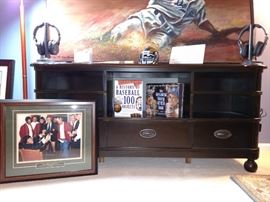 Stanley Furniture Co. television console with  Sony wireless headphones on top