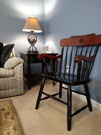 Le High University armchair and black Stanley Furniture Co. single drawer side table