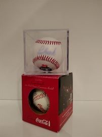Signed Lou Brock ball and St. Louis Cardinals 2006 baseball