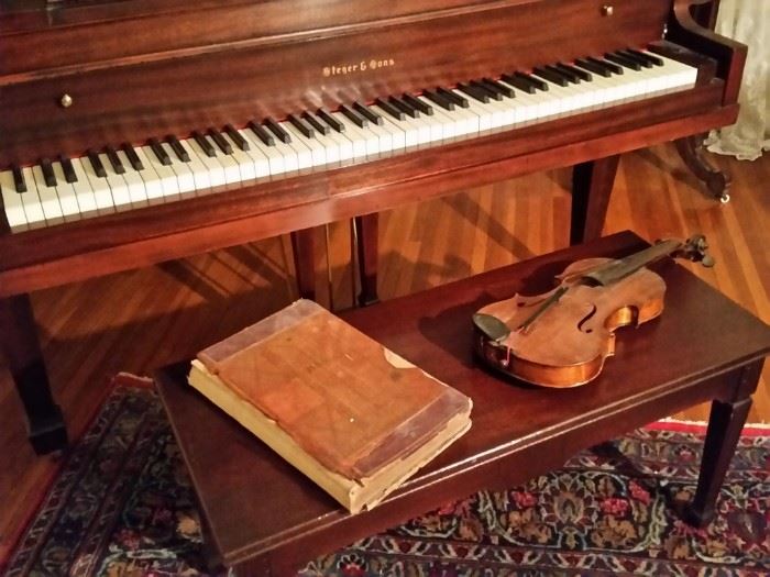 Ledger from 1901 and one of two violins.  This violin has an Antonius Stradivarius Cremonensis label inside.