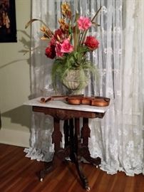 Marble top Victorian table and violin  that has a 'Guarneri' label inside.