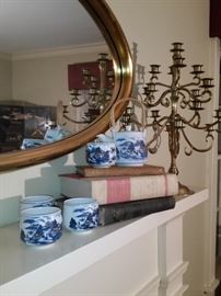 Some of the fine porcelain pieces and a brass candelabra