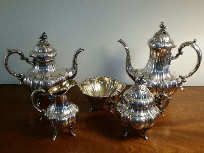 Reed & Barton 'Bradford' sterling silver coffee and tea set.  All items made of precious metals are stored in a safe off site until the days of the sale.