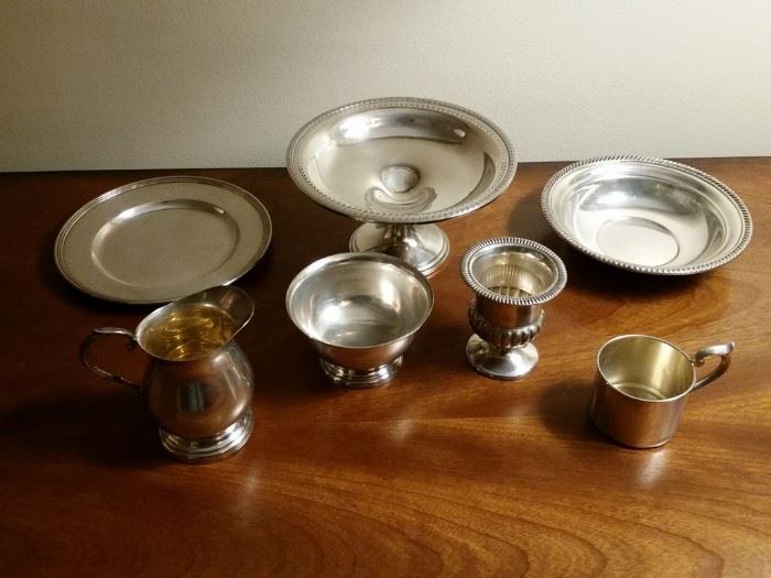 Several more of the many sterling silver pieces that will be for sale.  All items made of precious metals are stored in a safe off site until the days of the sale.