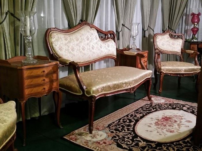 Pair of 3-drawer French nightstands/end tables.  A Rococo Revival parlor set that includes this settee, two armchairs, and two side chairs.