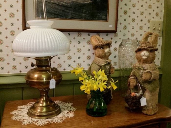 Converted brass oil lamp and two Easter bunnies