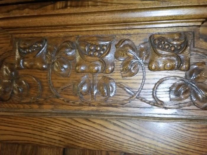 A closer look at the woodwork of the antique wardrobe