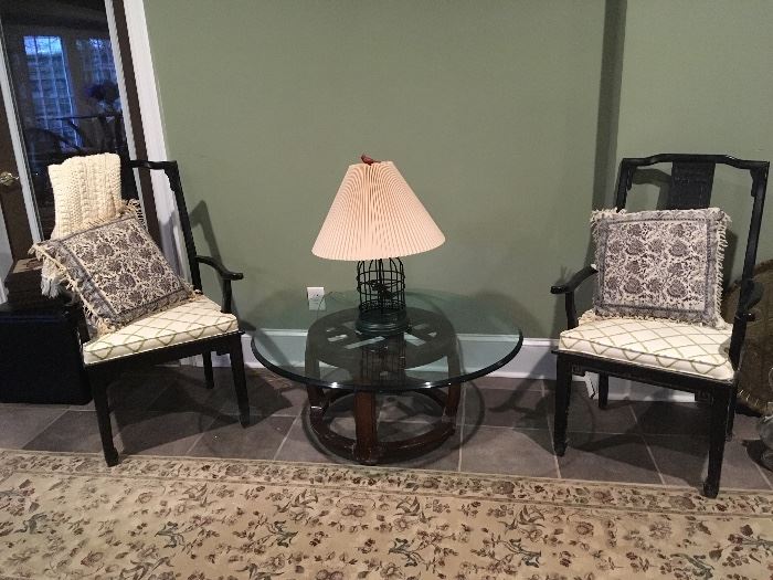 Pair of Black Chairs, Glass Coffee Table, Lamp.