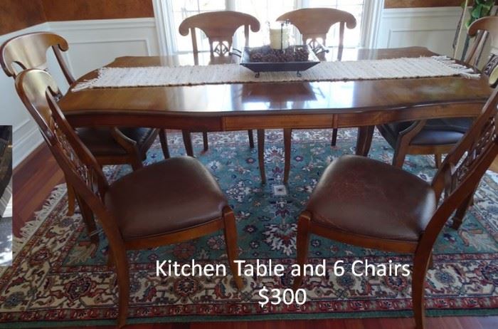 Kitchen Table six chairs with extra leaf