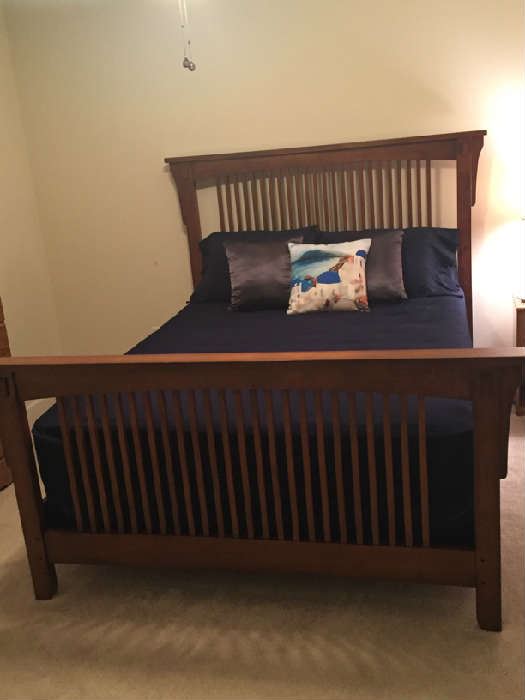 Queen Size Wood Bed; can be sold with or without mattress.  Décor not included