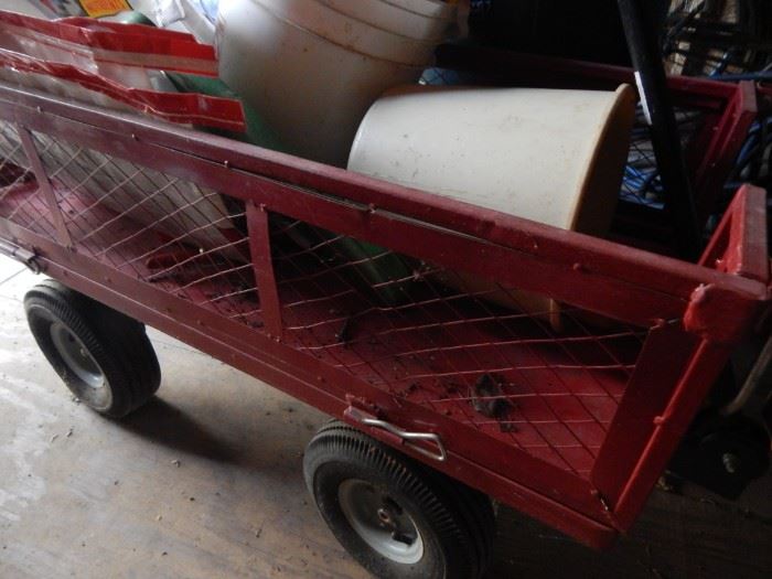 Great cart on wheels.  Move all your gardening items around the yard.