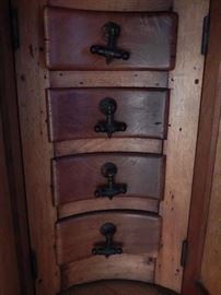 Curved row of drawers.