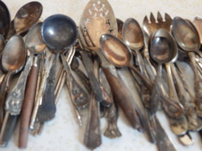 Many one of a kind silver plated antique flatware pieces.