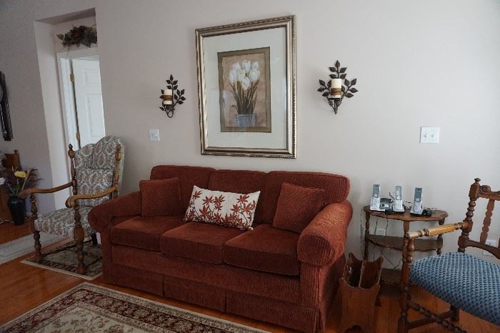 Antique chair, Sofa newly reupholstered, leaf candle holders, picture