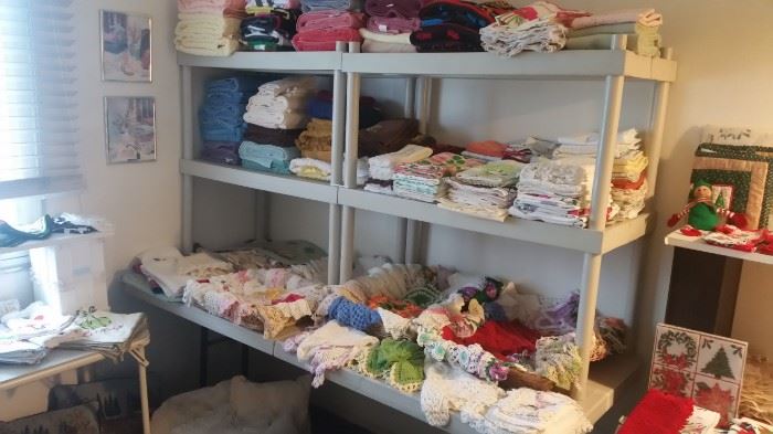 Huge amount of linens, towels, sheets, etc.  Lots of doilies.