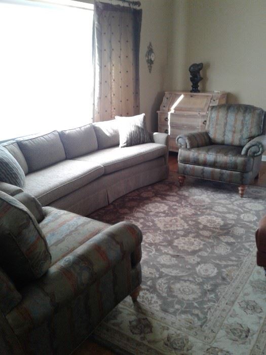 View of sofa and chairs to be sold