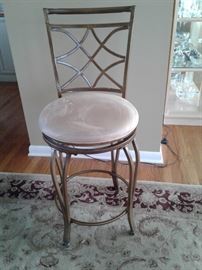 One of three swivel stools