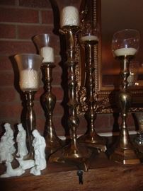 Nice selection of candle holders on the mantel