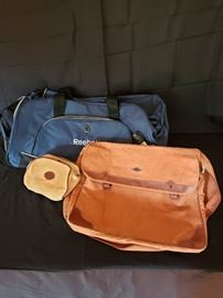 Rolling duffel and satchel https://ctbids.com/#!/description/share/104154