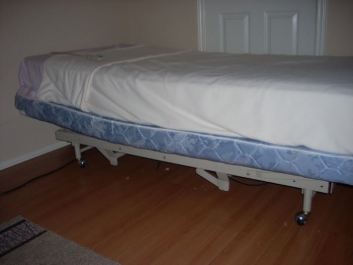 One of Two Twin Bed that Adjust