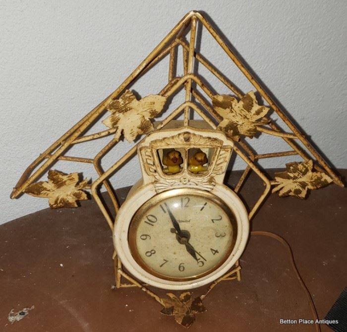 Very Unusual German Clock, working and the Birds come in and Out, it is metal.