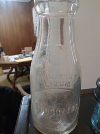 Early Glass Milk Bottle