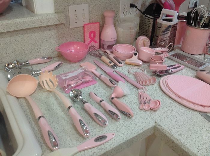 Assorted utensils including Cuisinart and Kitchenaid