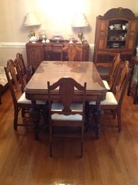 Antique dining room table with 6 chairs