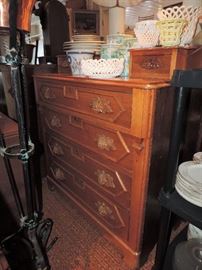 a NICE Walnut Dresser...one of 6 in this sale...tightly squeezed into a corner....