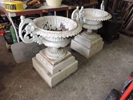 another view of the cast iron urns in the garage...STILL SORTING OUT THE GARAGE ITEMS...STAY TUNED !
