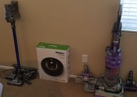 Two DYSON vacuum cleaners....and a Roomba
