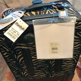 Adriene Animal Print Pristine Set  of Luggage. One Piece Never Used—Original Price  for All Three Over $1200. Paid $700.