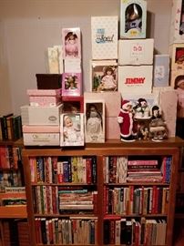 Effanbee, Madame Alexander, Gotz, Georgetown, and Danbury Mint dolls; Raikes Santa bear, cookbooks, Far Side collection, and Bob Ross art book, etc.