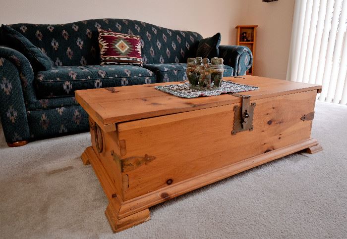 All wood trunk that opens for storage. Great coffee table or storage trunk at the end of a bed. Beautiful condition as with everything in this immaculate home.