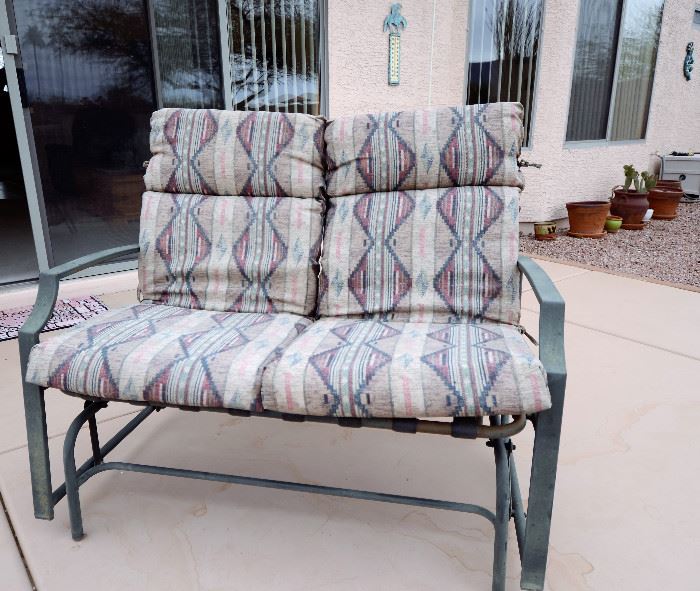Outdoor furniture. There is also a great outdoor patio table and set of chairs that has been undercover in the garage for sale.