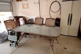 Large outdoor table and chairs kept undercover. In like new condition.