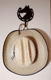 Horseshoe hook and cowboy hat.