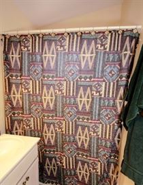 Shower curtain themed in the southwest aztec look.