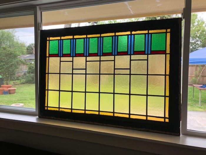 Framed stained glass window