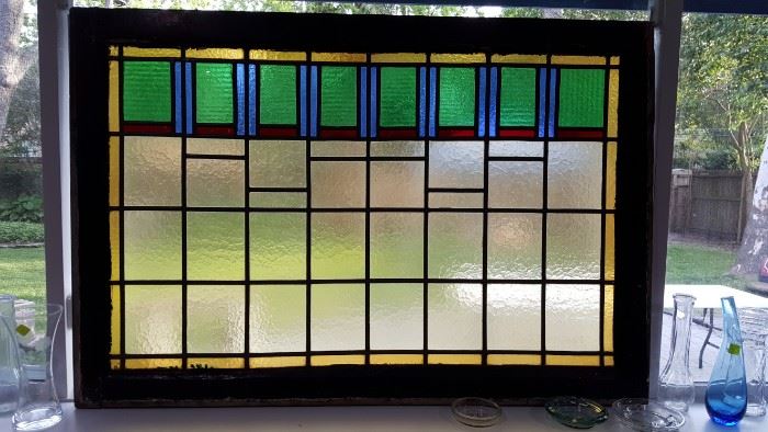 Gorgeous stained glass window in original frame