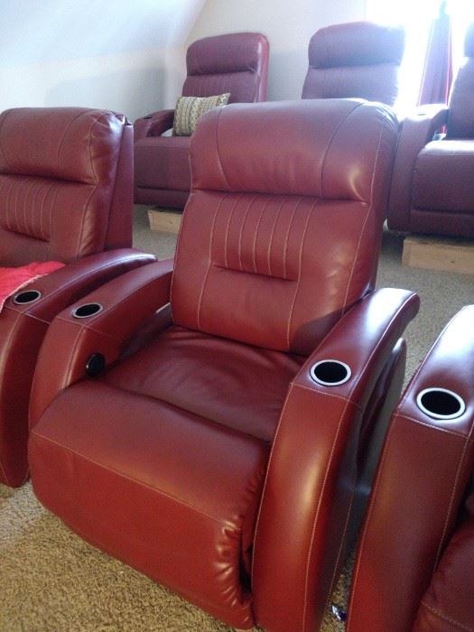 HOLY COW!!  These electric theatre chairs are awesome!!  With the puck of a button it will will recline you all the way back!!