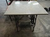 marble top sewing machine base table.