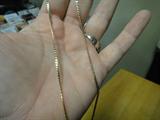14k gold necklace weighing 6.5 grams
