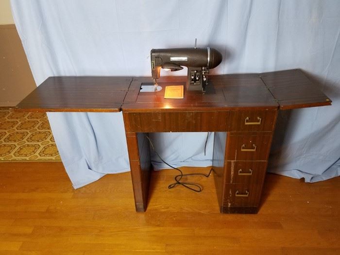 Mahogany Sewing Desk & Machine https://ctbids.com/#!/description/share/103808