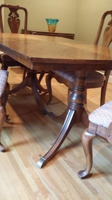 Six matching chairs are available,  and sold separately (or together with the table at a discount).  All were painstakingly refinished by the owner to match the table.