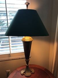 Heavy brass lamp with oval shade  This is one of two