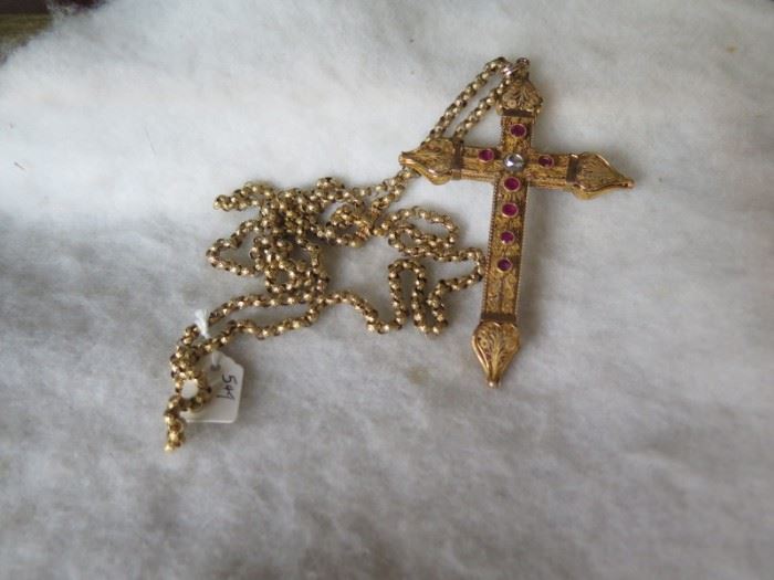 gold cross with diamond and rubies