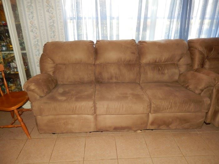 Couch with dual recliners.