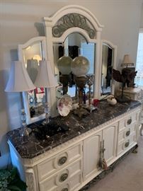 Marble top dresser with mirror, lamps.