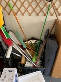 Variation of cleaning tools and garage items.